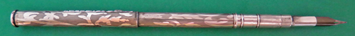 6281: VERY LONG ETCHED TELESCOPING DIP PEN WITH STEEL PEN. Unmarked, but possibly made of sterling, assumption from the appearance and patina.